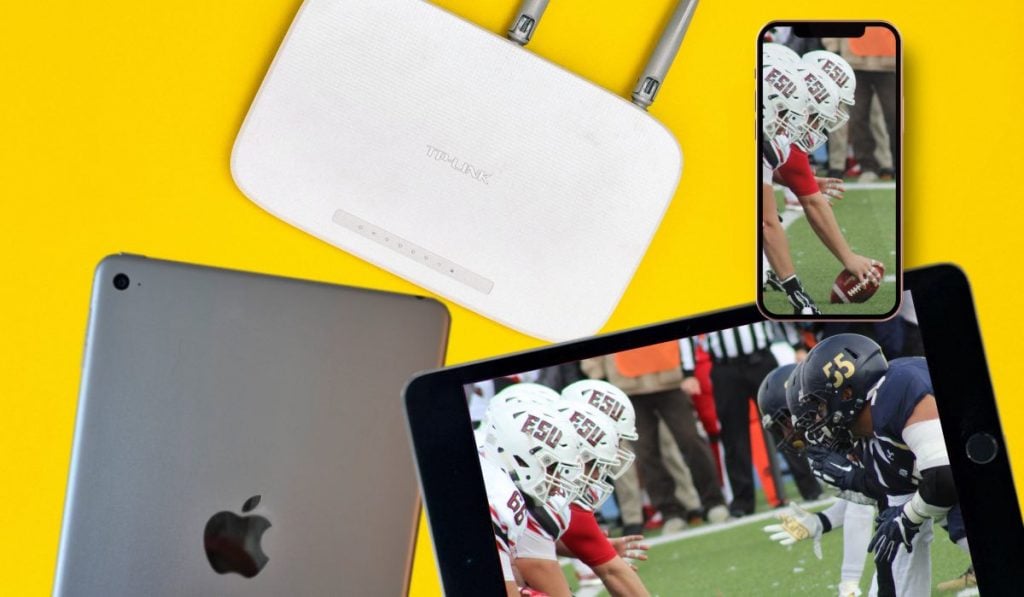 a router, two iPads and an iPhone on yellow background