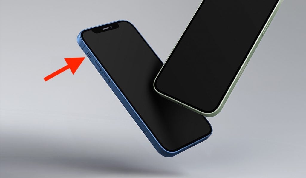 An image of two iPhones suspended in air with their screens off. One iPhone has a green case, the other iPhone has a blue case. The cast shadow to the bottom-left corner of the image. A red arrow points to the top-left corner of the iPhone with the blue case, highlighting the area with the silent mode button