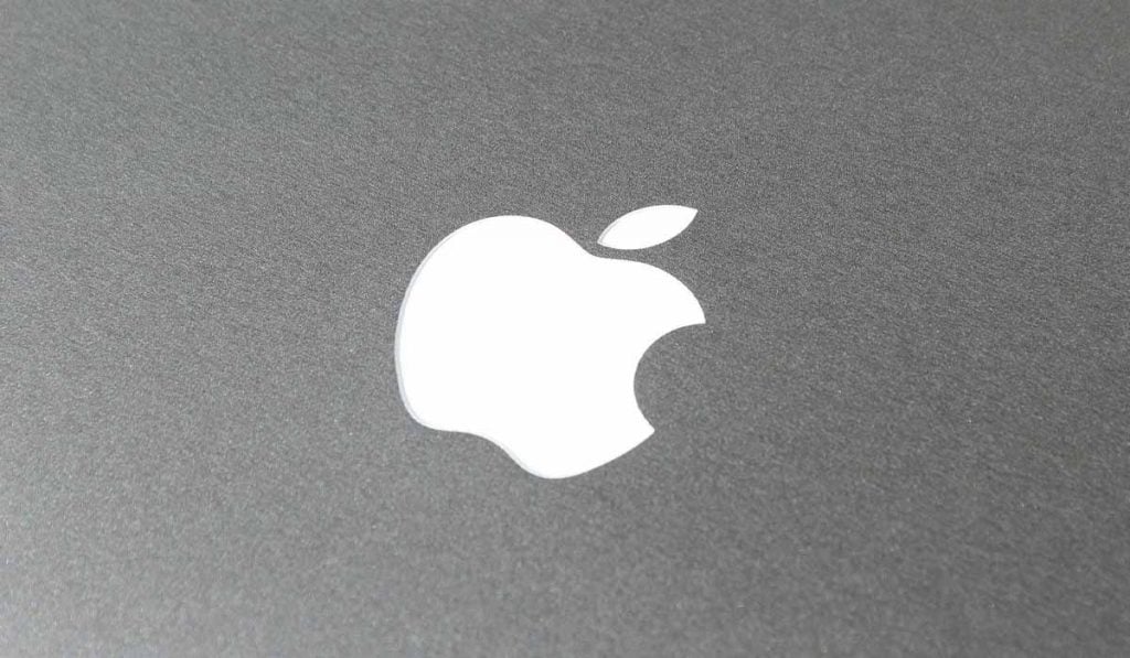 Logo Apple su sfondo grigio