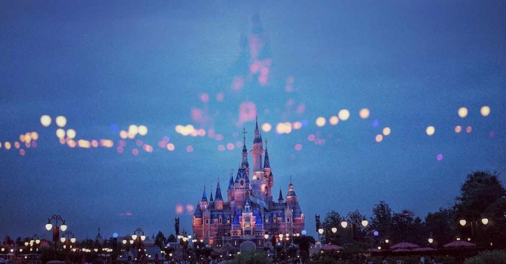 A realistic image of the Disney Castle with some light overlaid