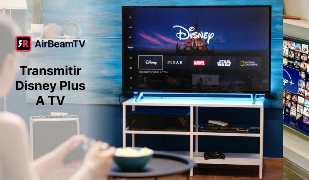 Una mujer sentada en un sofá con una consola en la mano. Tiene un cuenco de palomitas en la mesa de centro frente a ella. La pantalla de un televisor frente a ella muestra la interfaz de Disney Plus. La cabecera en la esquina superior izquierda dice: "Cast Disney Plus to TV". Hay un logotipo de AirBeamTV sobre la cabecera