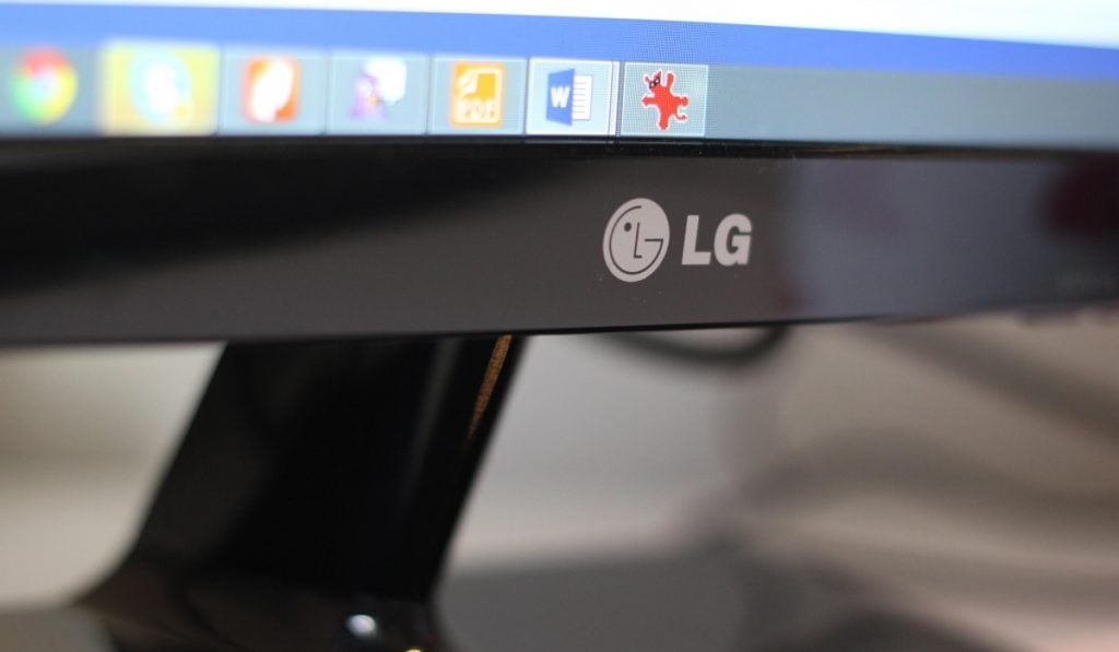 A bottom on an LG monitor with some icons visible