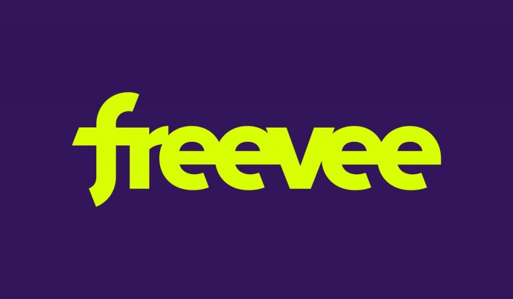 A yellow Amazon Freevee logo on dark purple backgorund