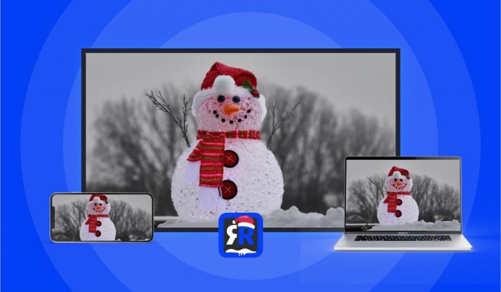 An iPhone, a MacBook and a Smart TV displaying the same image of a snowman dressed in a scarf and a hat. There's a Christmas AirBeamTV logo at the bottom of the image and the background is blue.