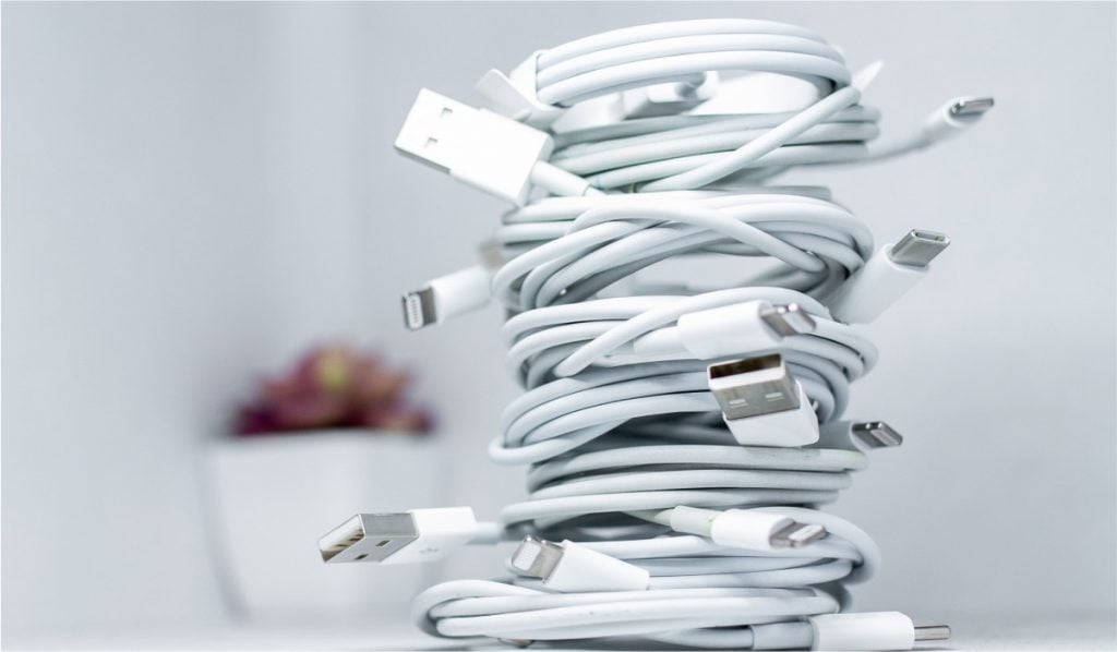 Several USB-C and iPhone charging cables bundled up into