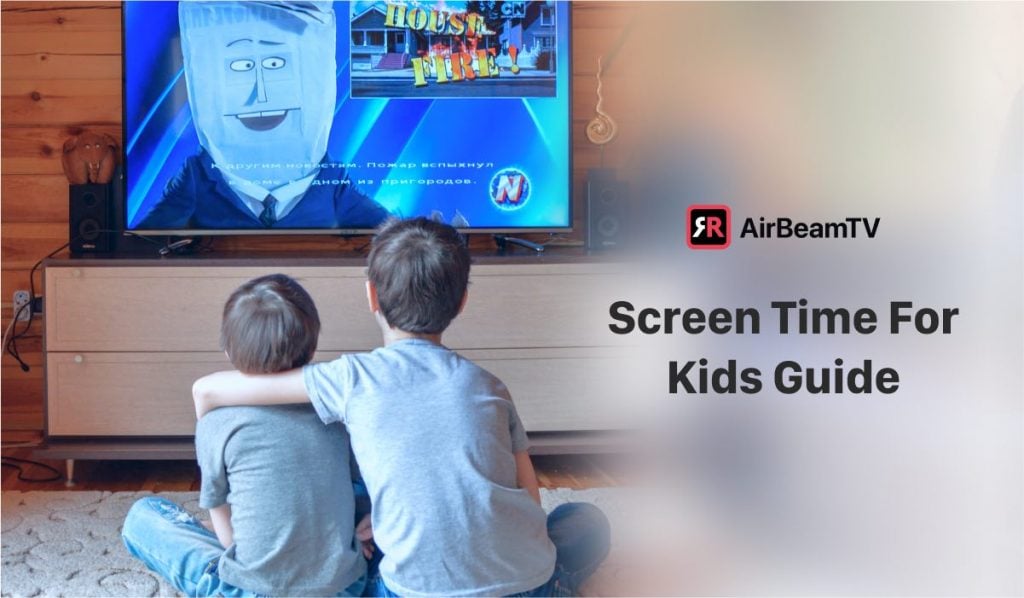Two kids sit in an embrace in front of a TV. There's a cartoon on the TV screen. The header on the right side of the image says "Screen Time For Kids Guide" and there's an AirBeamTV logo above the image.