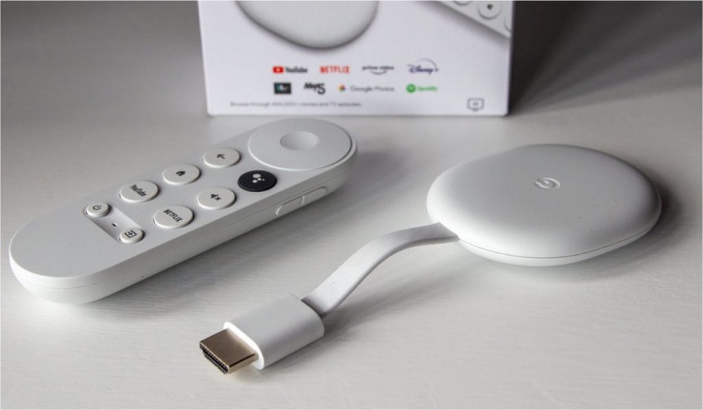 A chromecast device and remote as well as a Chromecast product box
