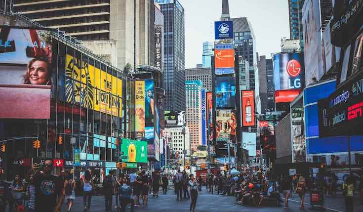 Times Square in New York with billboards and people