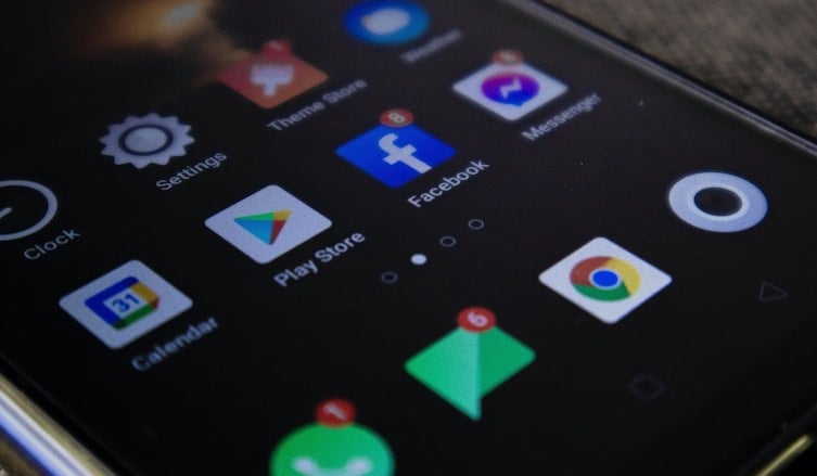 A closeup of an Android app menu screen with Play Store, Facebook and Messenger icons among others