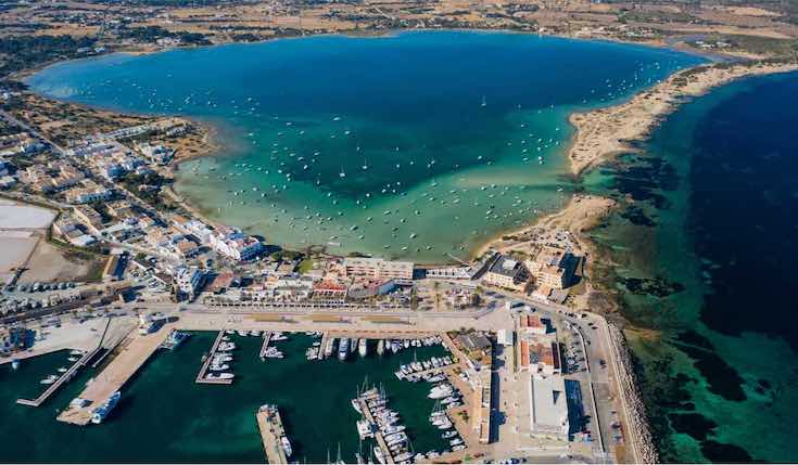 drone shot of a harbor in ibiza Spain