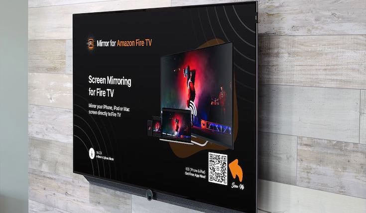 A Smart TV hanging from a wall and seen at an angle. The Smart TV screen displays an ad for the AirBeamTV Mirror for Fire TV app
