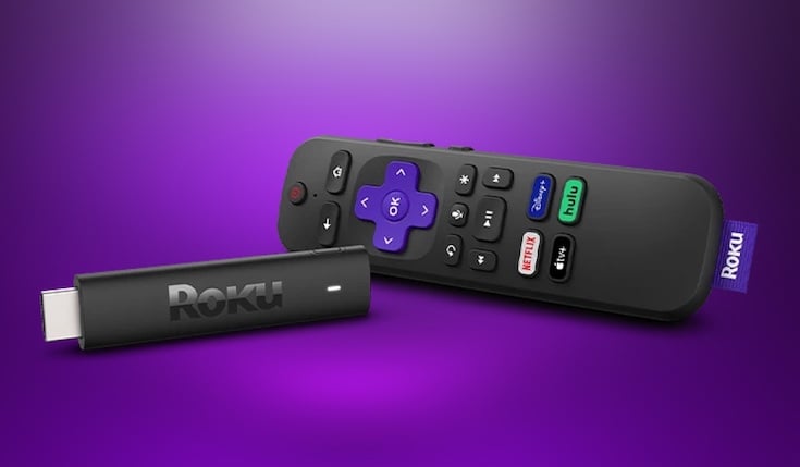 Roku Streaming Stick 4k and a Roku remote on purple gradient background