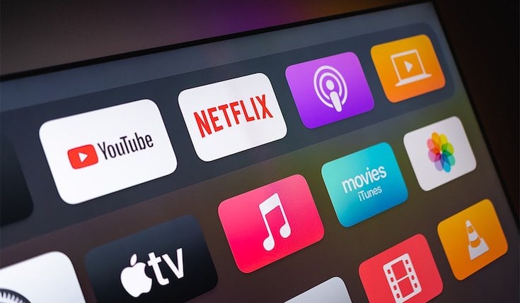 several app icons on a Smart Tv interface. The apps include Apple Tv Plus, Apple Music, Netflix and Youtube