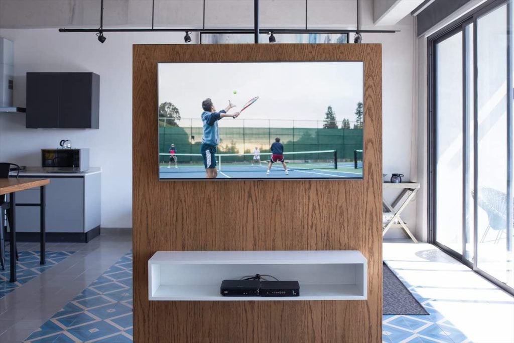 Tennis on TV in a living room
